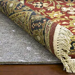 Residential and commercial interior cleaning in Phoenix by First Class Green Cleaning showing rug and rug pad