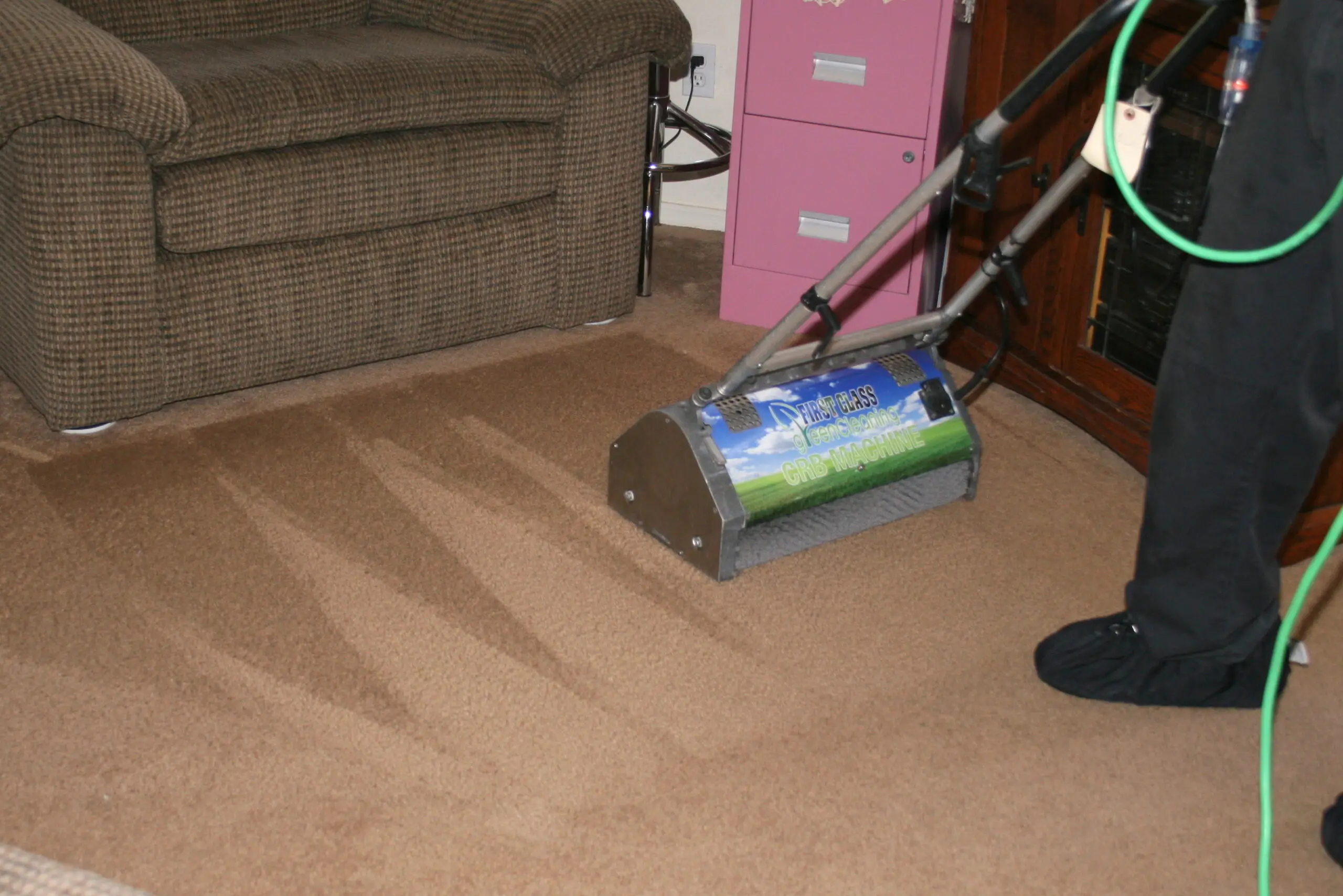 Residential and commercial interior cleaning in Phoenix by First Class Green Cleaning showing carpet cleaning machine