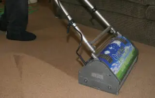 Residential and commercial interior cleaning in Phoenix by First Class Green Cleaning showing carpet cleaning machine