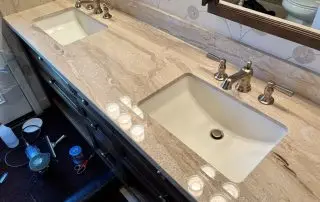 Travertine vanity top with sink after polishing