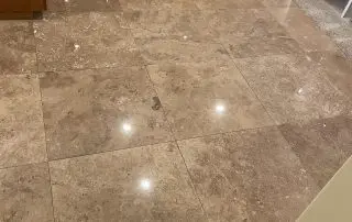 Travertine floor test area after stone polishing